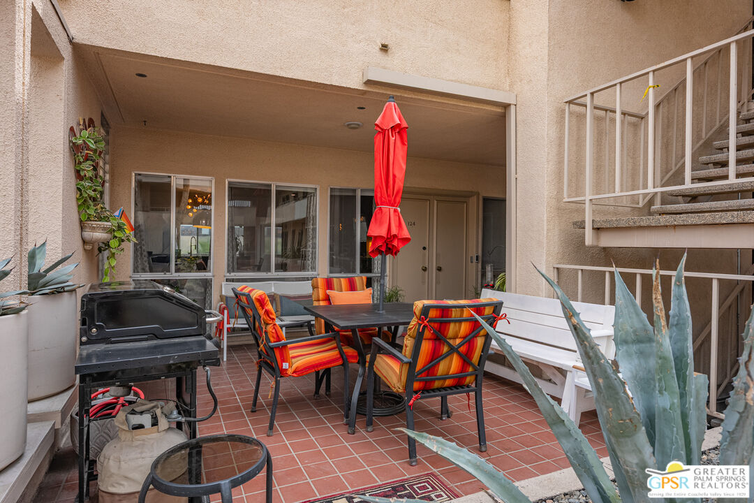 277 East Alejo Road, Unit 124 Palm Springs, CA 92262 - Photo 4 of 25 a outdoor space with furniture