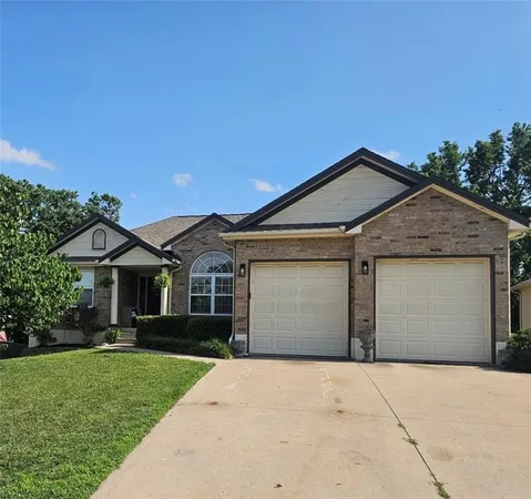 $395,000 | 1305 Southwest Graystone Drive, Grain Valley, MO 64029