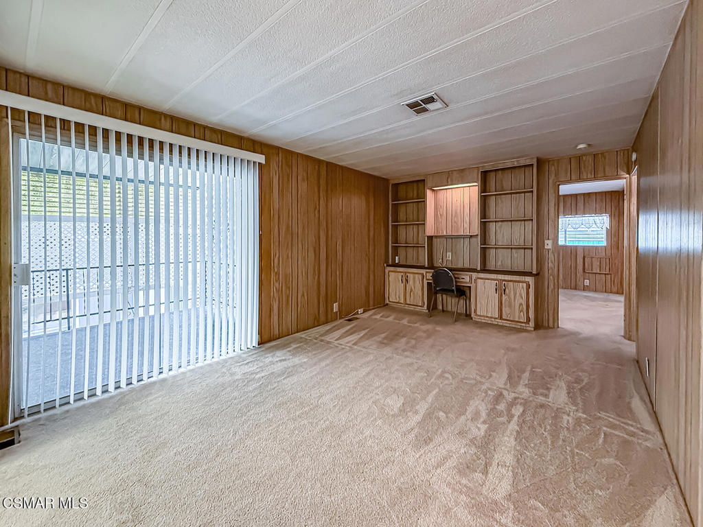 195 Tierra Rejada Road, Unit 116 Simi Valley, CA 93065 - Photo 11 of 36 a view of livingroom with an empty space