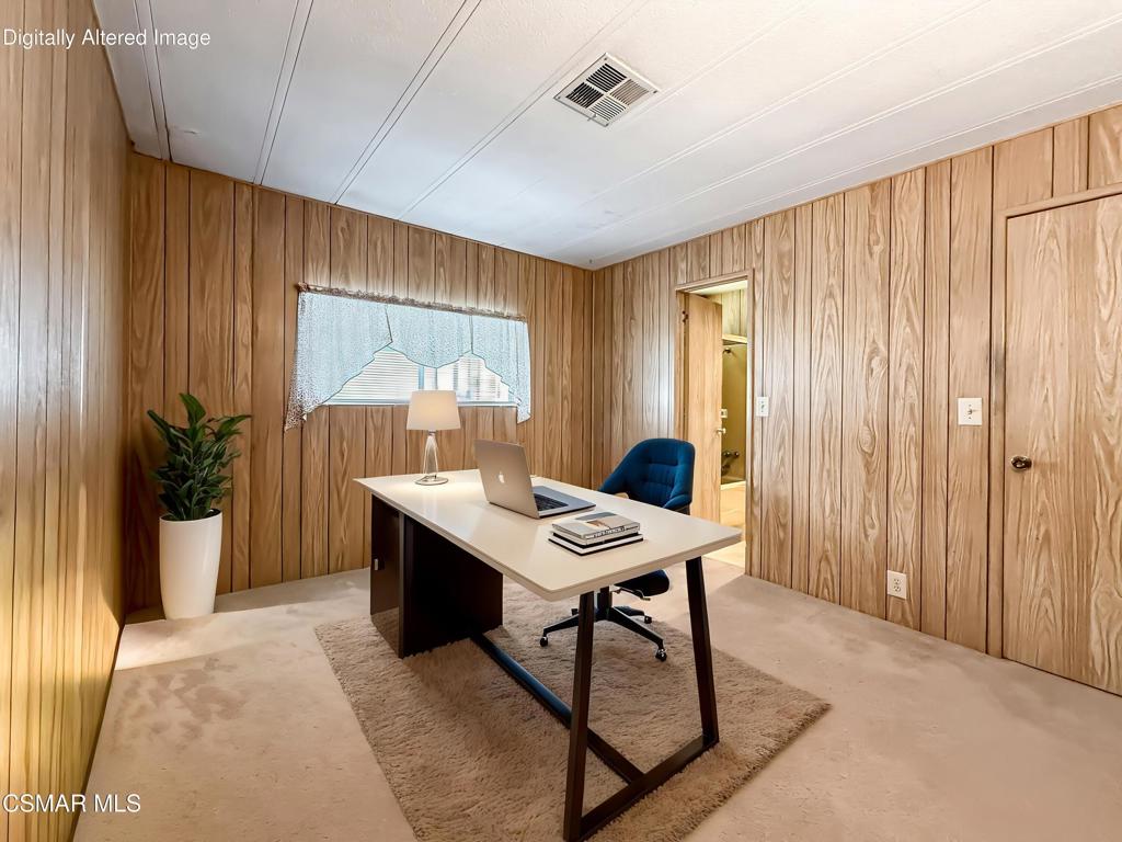 195 Tierra Rejada Road, Unit 116 Simi Valley, CA 93065 - Photo 14 of 36 a workspace with furniture and window