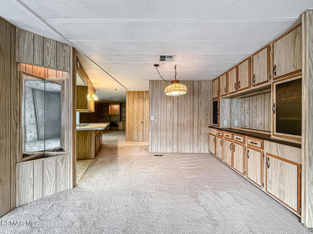 195 Tierra Rejada Road, Unit 116 Simi Valley, CA 93065 - Photo 6 of 36 a view of an entryway with wooden floor