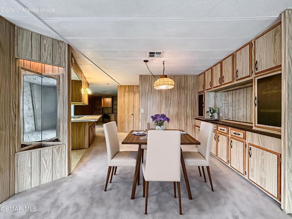 195 Tierra Rejada Road, Unit 116 Simi Valley, CA 93065 - Photo 7 of 36 a view of a dining room with furniture window and wooden floor