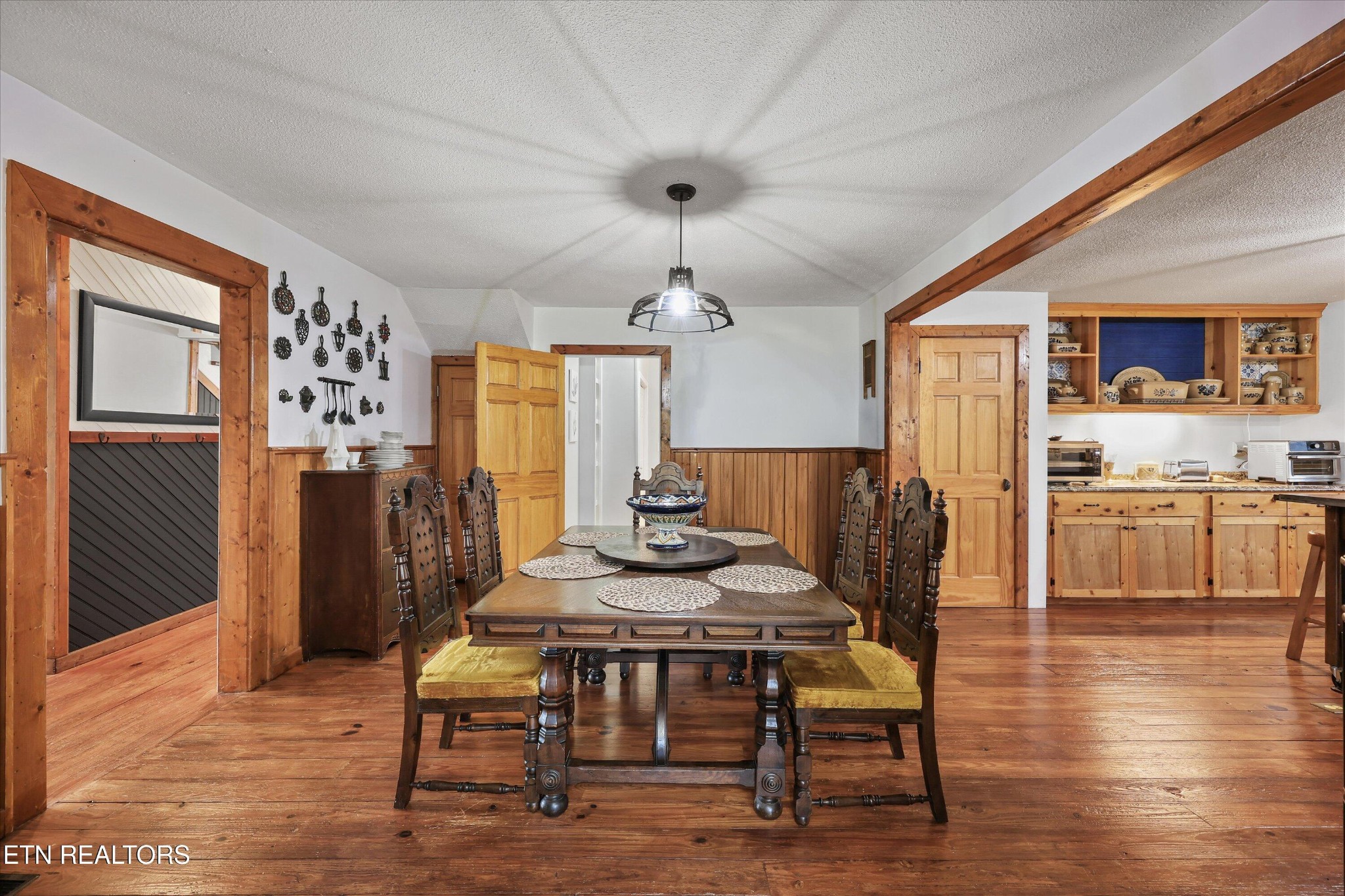 7969 Glendale Community Road Greenback, TN 37742 - Photo 20 of 56 a view of a dining room with furniture and wooden floor