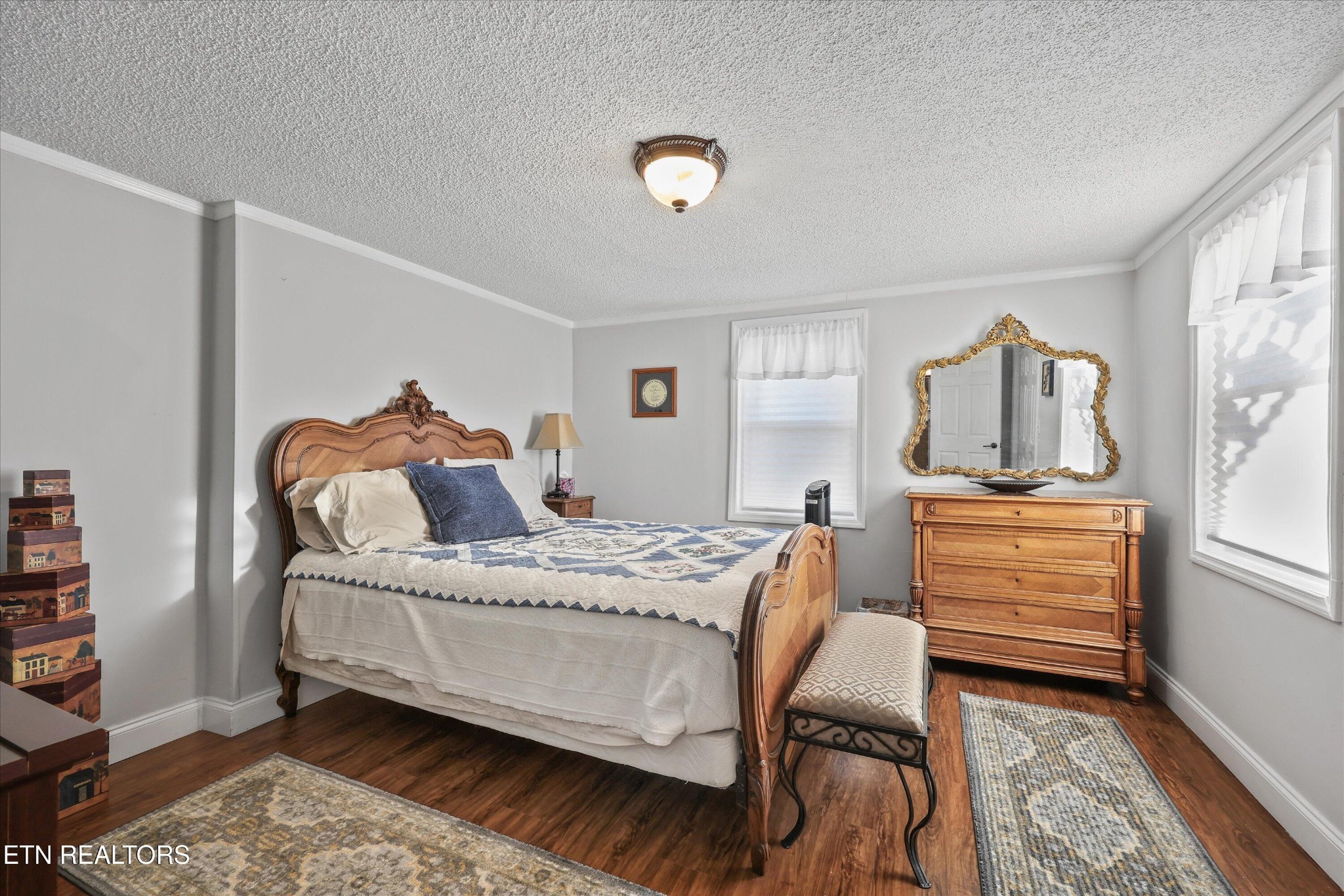 7969 Glendale Community Road Greenback, TN 37742 - Photo 30 of 56 a bedroom with a bed and wooden floor