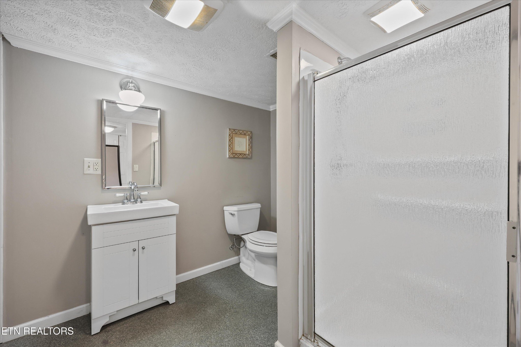 7969 Glendale Community Road Greenback, TN 37742 - Photo 34 of 56 a bathroom with a toilet sink and mirror