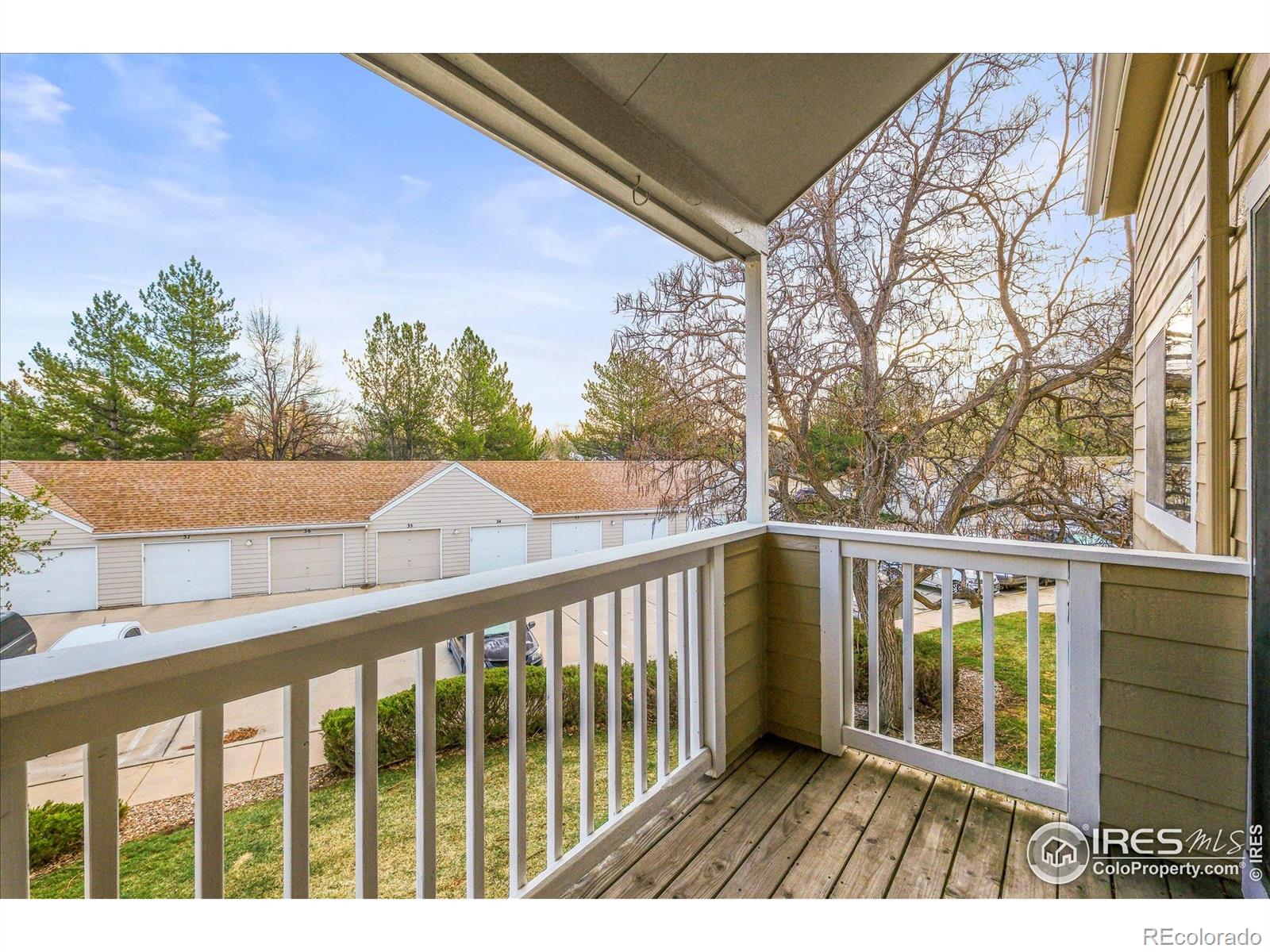 4945 Twin Lakes Road, Unit 39 Boulder, CO 80301 - Photo 6 of 22 a view of balcony with wooden floor