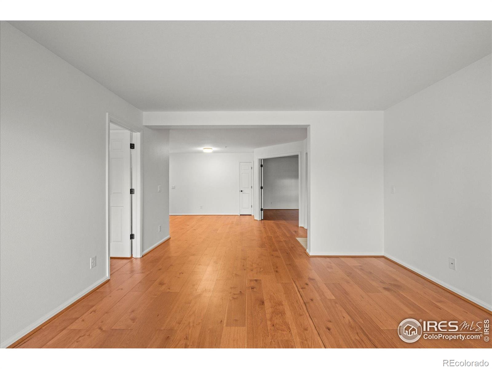 4945 Twin Lakes Road, Unit 39 Boulder, CO 80301 - Photo 7 of 22 a view of empty room with wooden floor