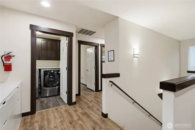 workspace with wooden floor and windows