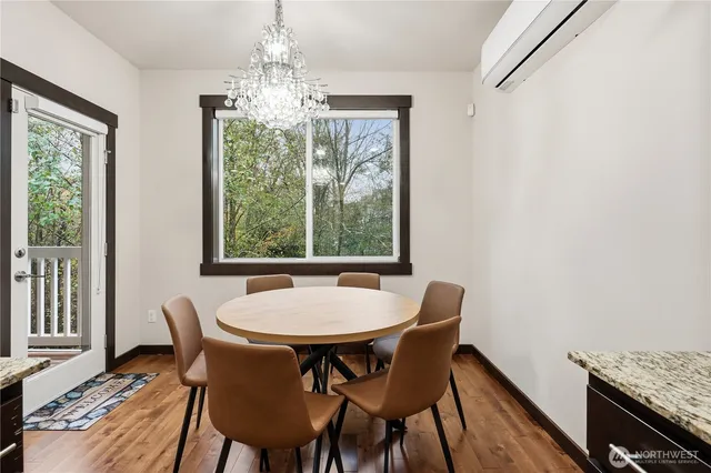 a bathroom with a toilet a sink and a mirror