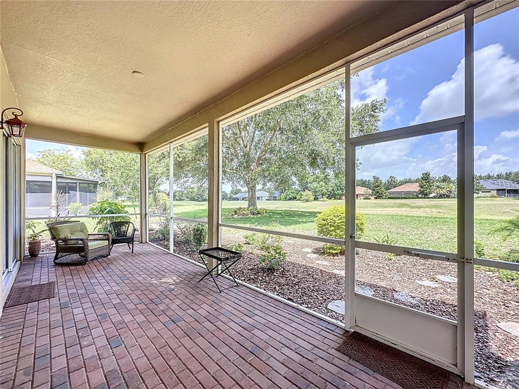 243 Bayou Bend Road Groveland, FL 34736 - Photo 45 of 77 a living room with large windows