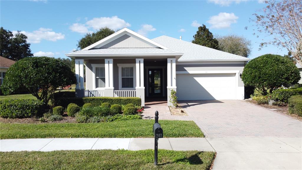 243 Bayou Bend Road Groveland, FL 34736 - Photo 49 of 77 a front view of a house with a yard