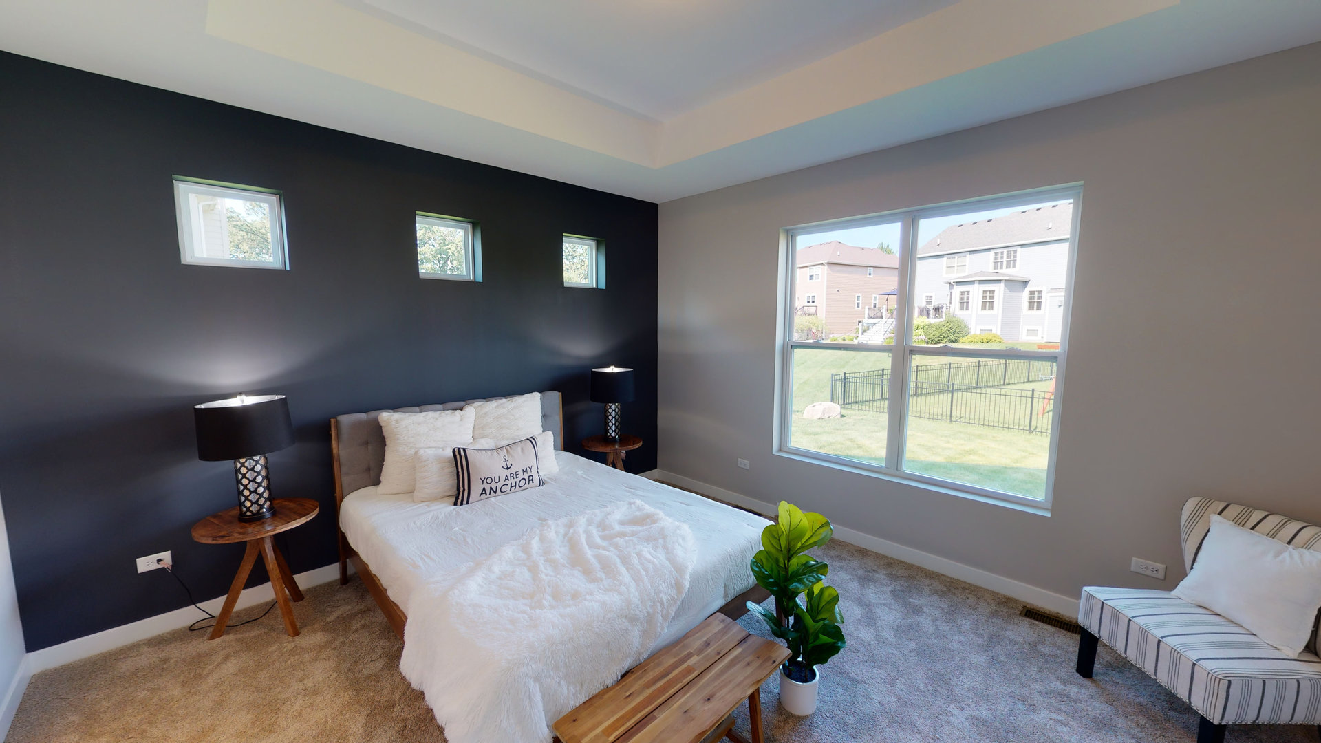 123 West Cache Isle Circle Channahon, IL 60410 - Photo 18 of 22 a bed sitting in a bedroom next to a window