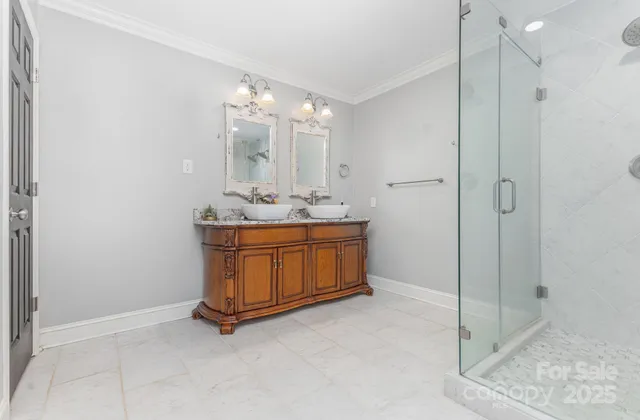 a room with a mirror and a sink