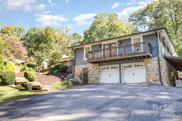 a view of a house with a street