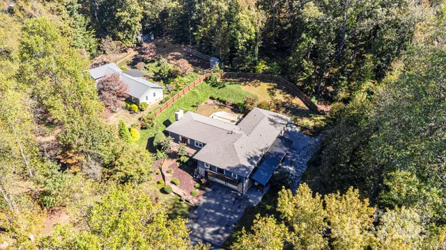 an aerial view of residential house with outdoor space