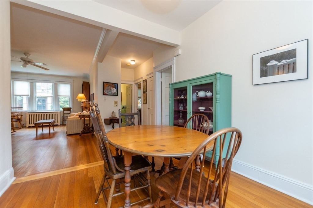 63 Babcock Street, Unit B1 Brookline, MA 02446 - Photo 14 of 32 a view of a dining room with furniture and wooden floor
