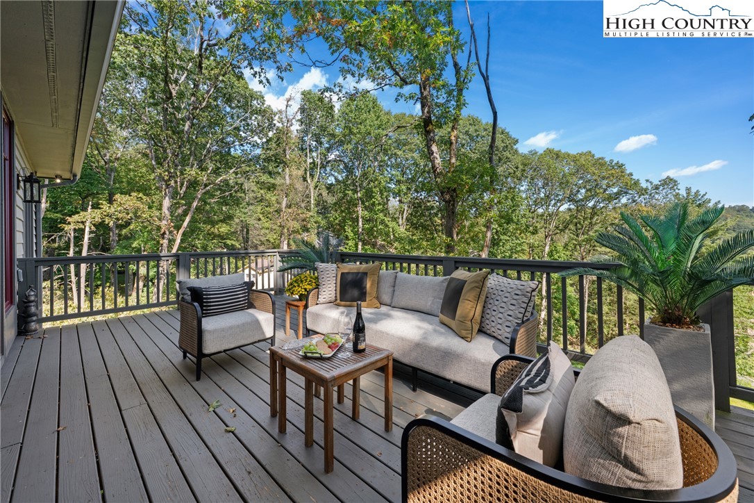 299 Edgewood Path Blowing Rock, NC 28605 - Photo 27 of 39 a roof deck view with a seating space