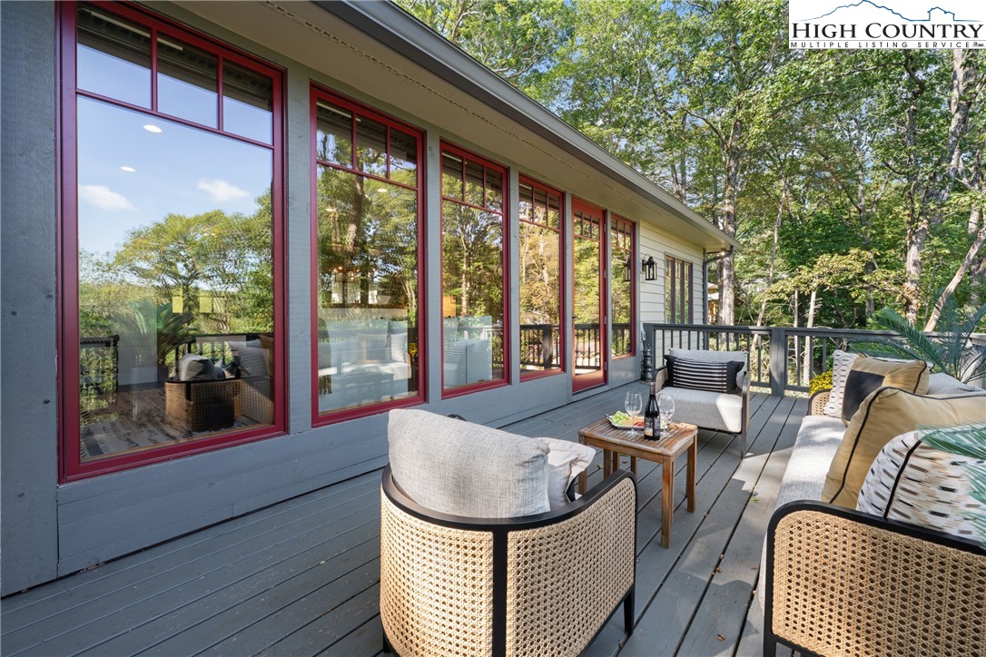 299 Edgewood Path Blowing Rock, NC 28605 - Photo 28 of 39 a outdoor living space with furniture and garden view