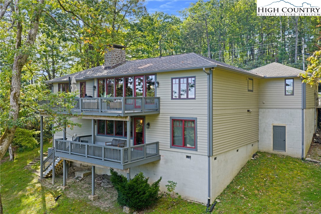 299 Edgewood Path Blowing Rock, NC 28605 - Photo 35 of 39 a view of house with a yard and furniture