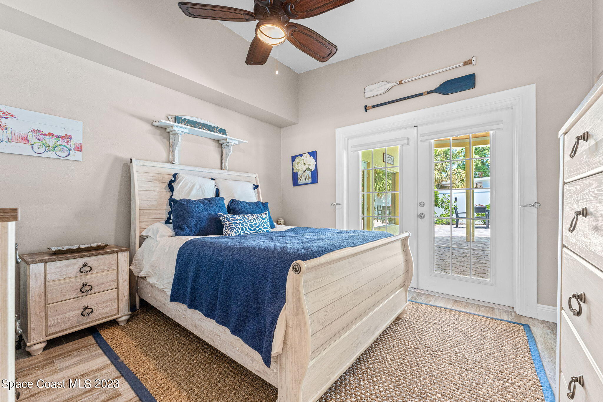 2230 Reef Avenue Indialantic, FL 32903 - Photo 13 of 31 a bedroom with a large bed and a window