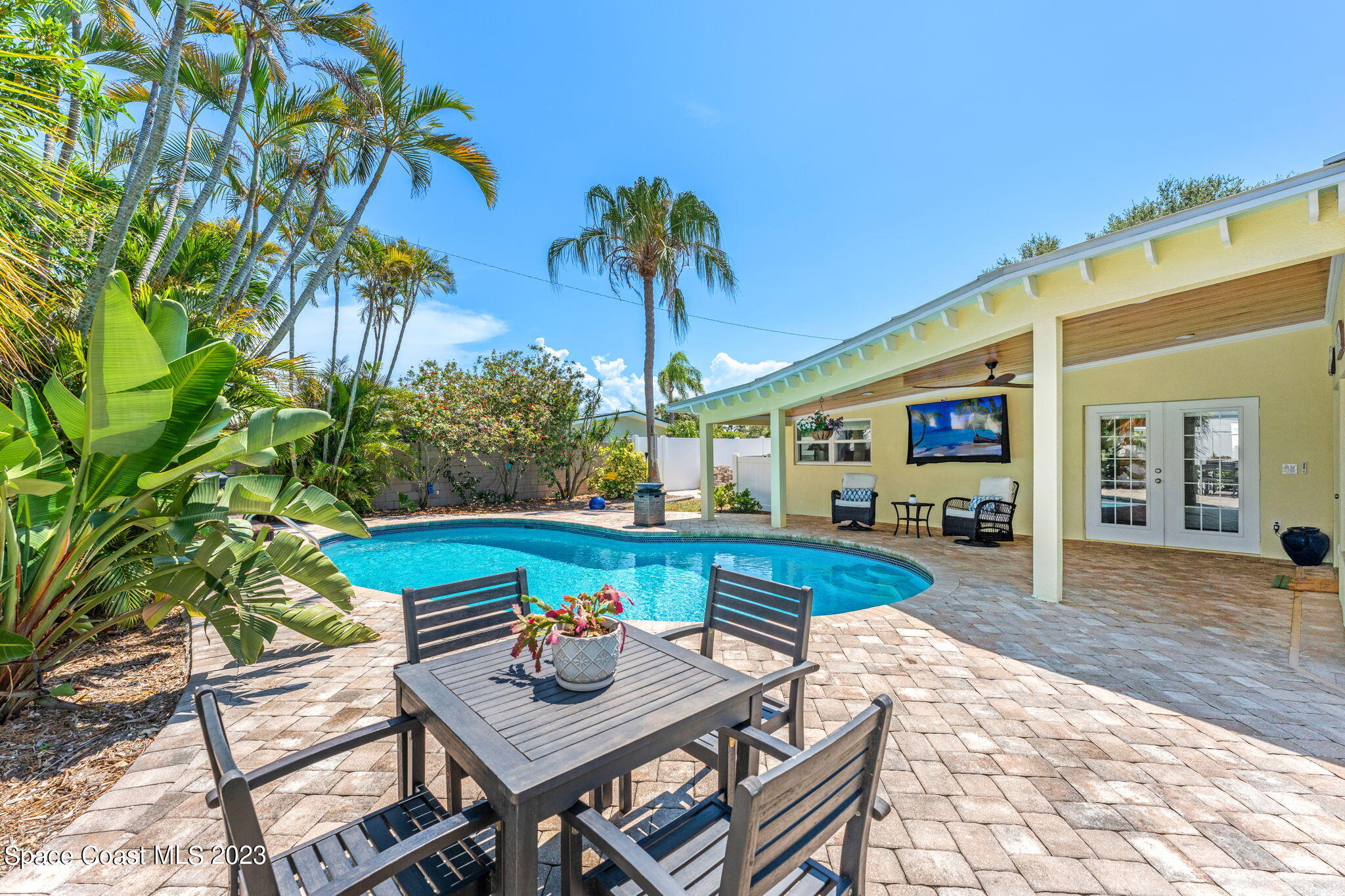 2230 Reef Avenue Indialantic, FL 32903 - Photo 21 of 31 a view of an outside dining space with furniture