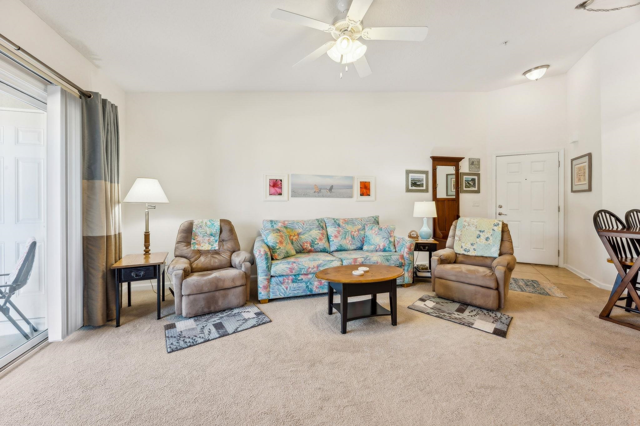 2861 Golden Lake Loop St. Augustine, FL 32084 - Photo 16 of 40 Living room featuring carpet and a ceiling fan