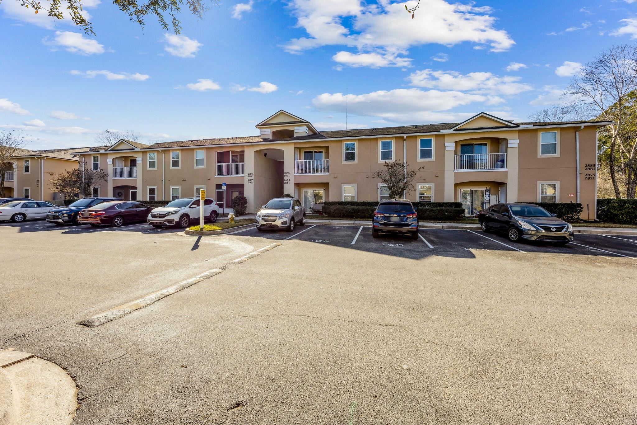 2861 Golden Lake Loop St. Augustine, FL 32084 - Photo 2 of 40 View of building exterior with uncovered parking