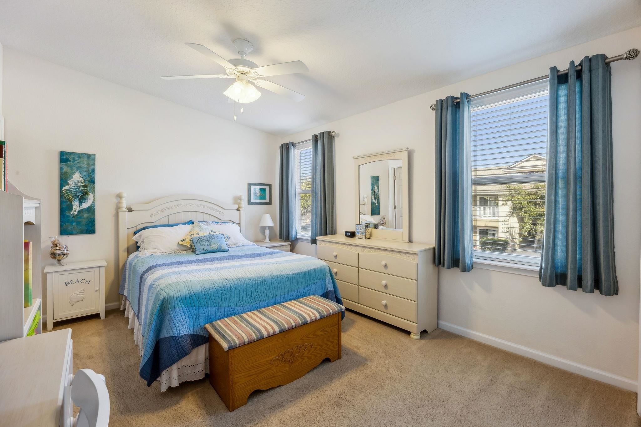 2861 Golden Lake Loop St. Augustine, FL 32084 - Photo 26 of 40 Bedroom featuring light carpet and ceiling fan