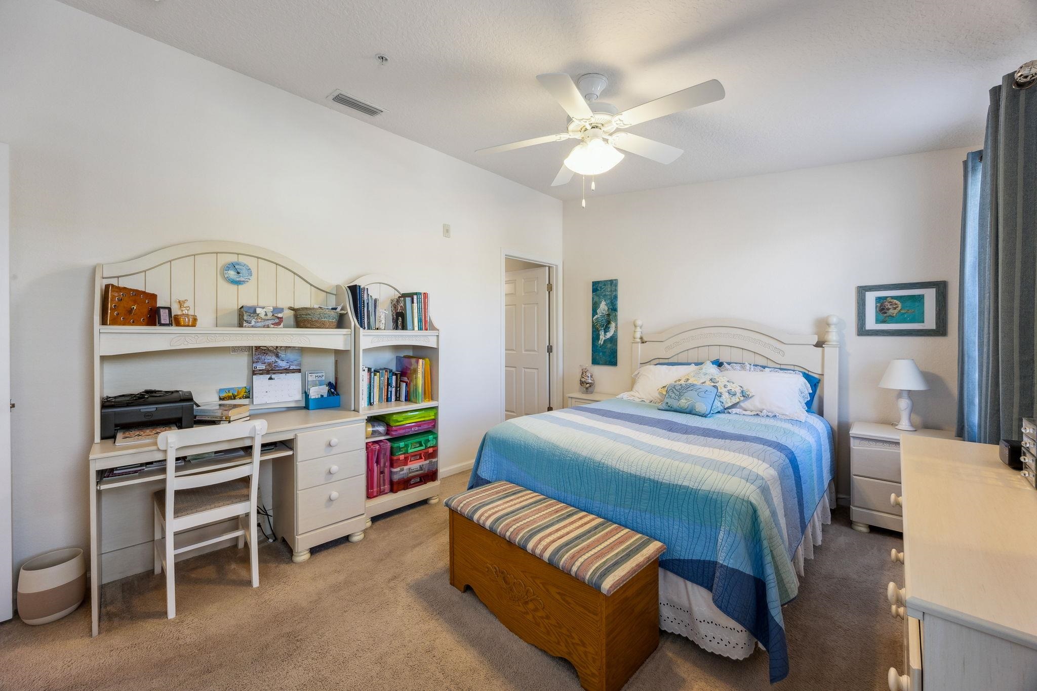 2861 Golden Lake Loop St. Augustine, FL 32084 - Photo 27 of 40 Bedroom with an office area, carpet flooring, and a ceiling fan