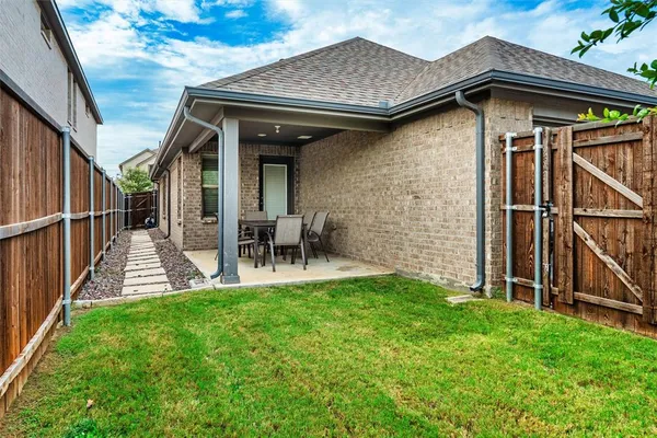 a view of a house with patio