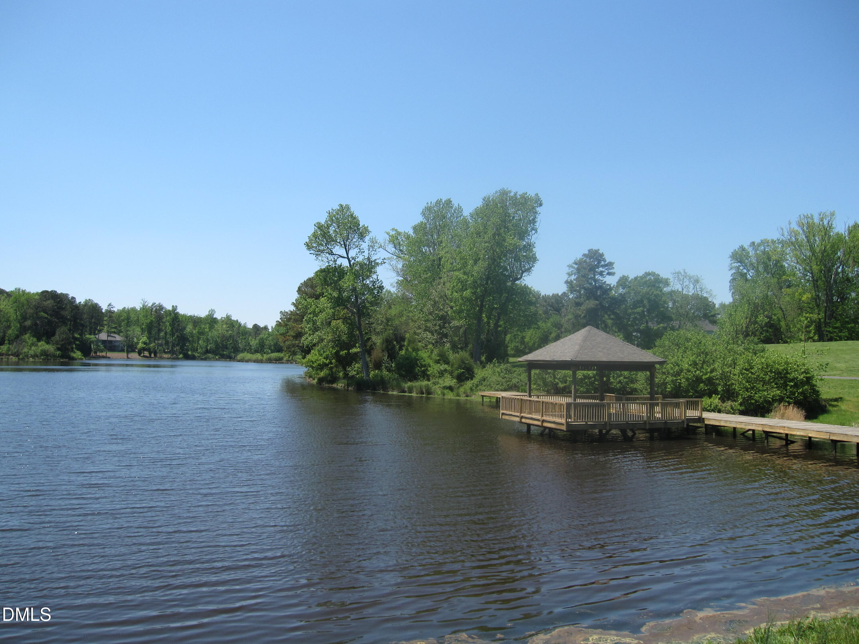 300 Lake Manor Road Chapel Hill, NC 27516 - Photo 84 of 99 a view of a lake with houses