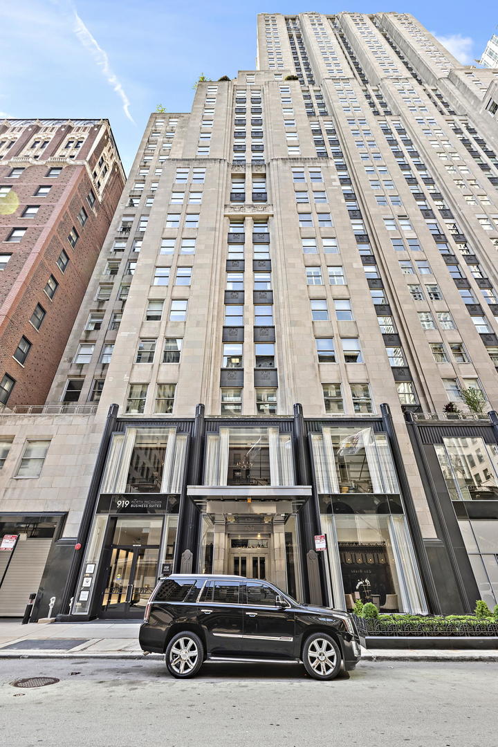 159 East Walton Place, Unit 9B Chicago, IL 60611 - Photo 1 of 28 front view of a building