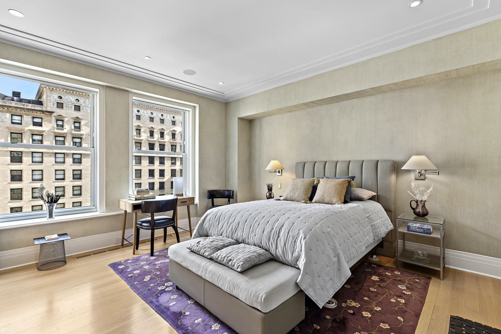 159 East Walton Place, Unit 9B Chicago, IL 60611 - Photo 16 of 28 a bedroom with a large bed a couch and two large window