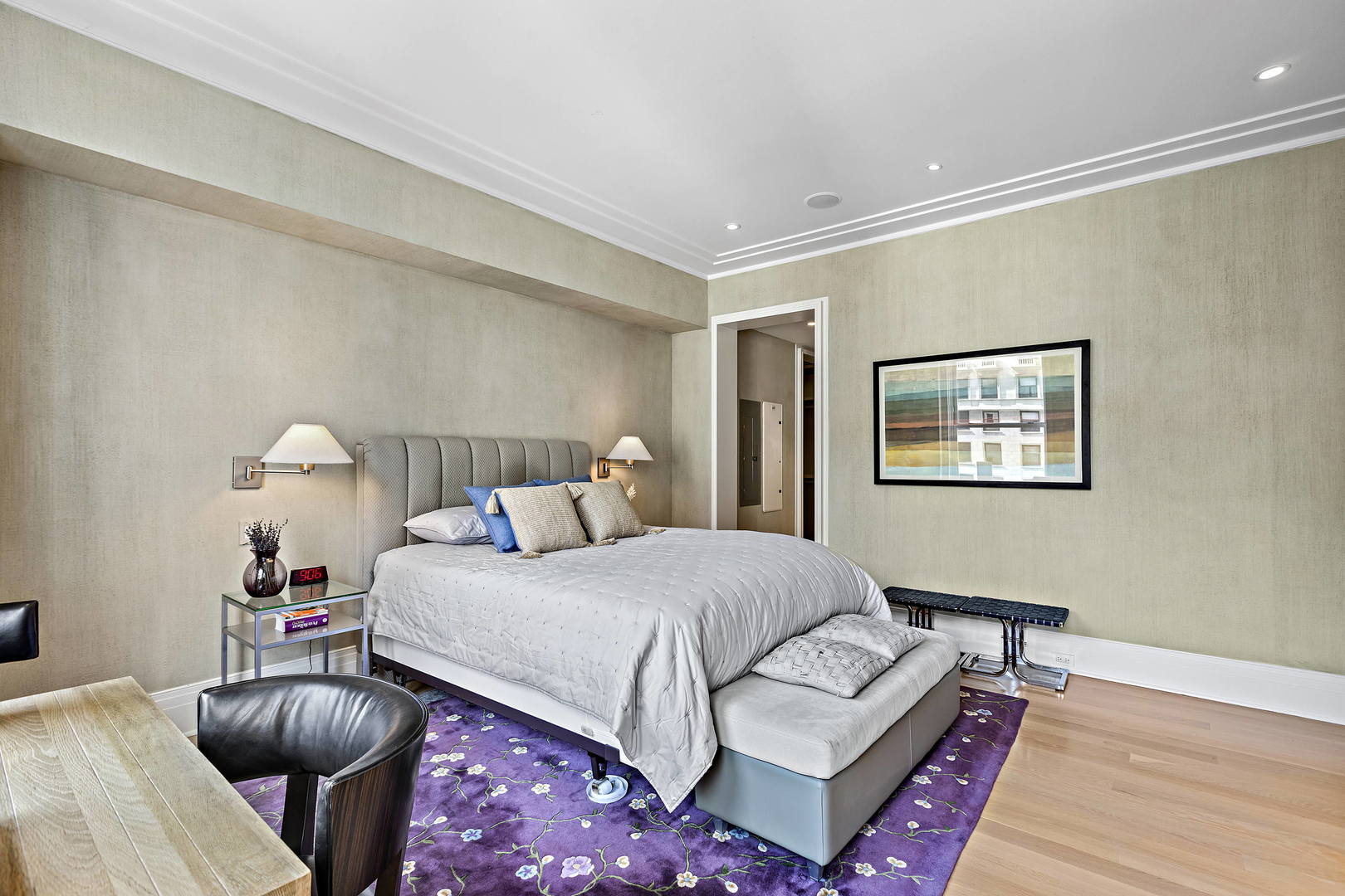 159 East Walton Place, Unit 9B Chicago, IL 60611 - Photo 17 of 28 a bedroom with a bed and a couch