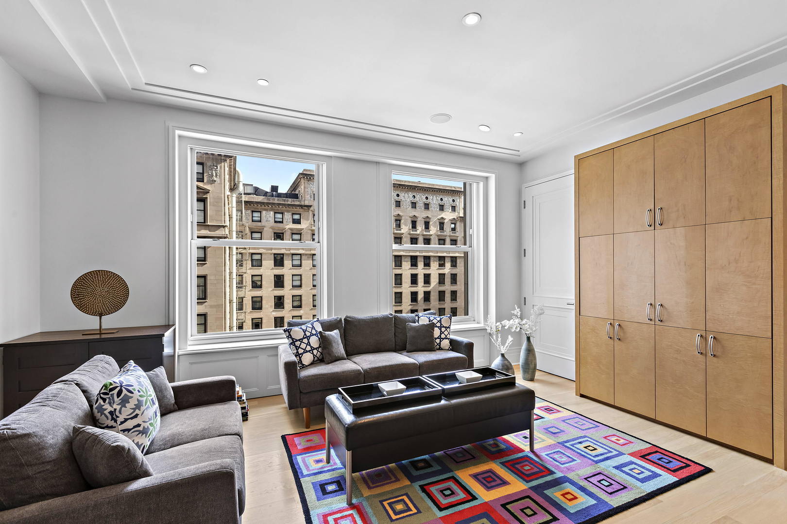 159 East Walton Place, Unit 9B Chicago, IL 60611 - Photo 9 of 28 a living room with furniture and a window