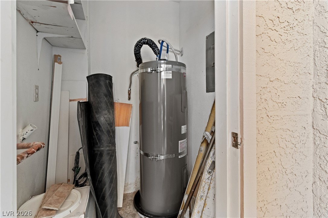 2232 Aspen Mirror Way, Unit 103 Laughlin, NV 89029 - Photo 29 of 50 Utility room on the front balcony featuring NEW secured water heater