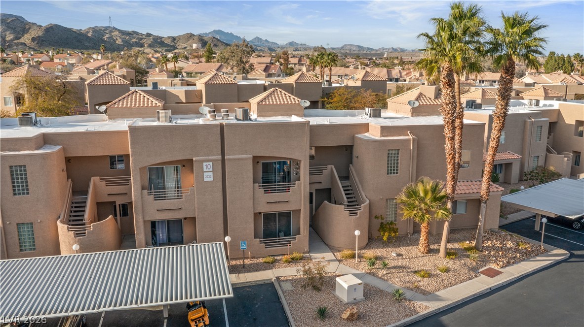 2232 Aspen Mirror Way, Unit 103 Laughlin, NV 89029 - Photo 43 of 50 View of building exterior with a residential view and a mountain view