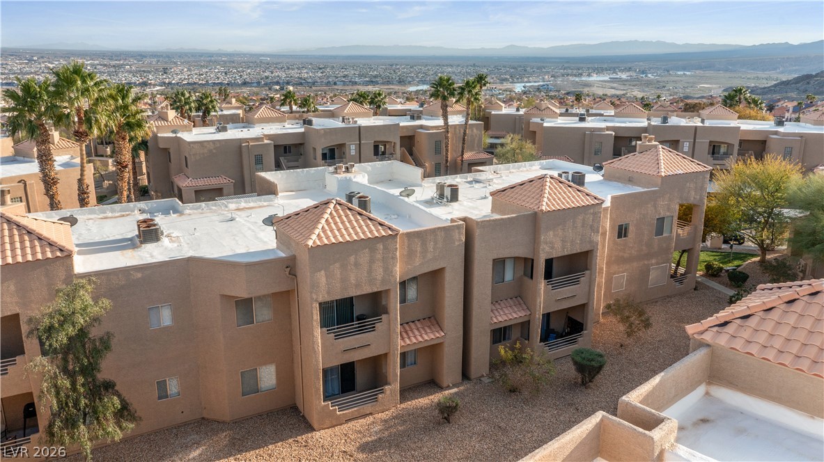 2232 Aspen Mirror Way, Unit 103 Laughlin, NV 89029 - Photo 44 of 50 View of building exterior featuring a residential view and a mountain view