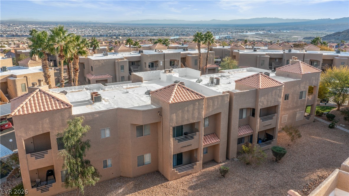 2232 Aspen Mirror Way, Unit 103 Laughlin, NV 89029 - Photo 45 of 50 Aerial perspective of suburban area featuring a mountainous background