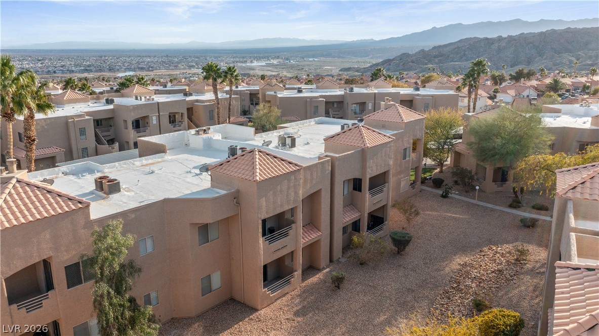 2232 Aspen Mirror Way, Unit 103 Laughlin, NV 89029 - Photo 46 of 50 Aerial view of residential area featuring mountains