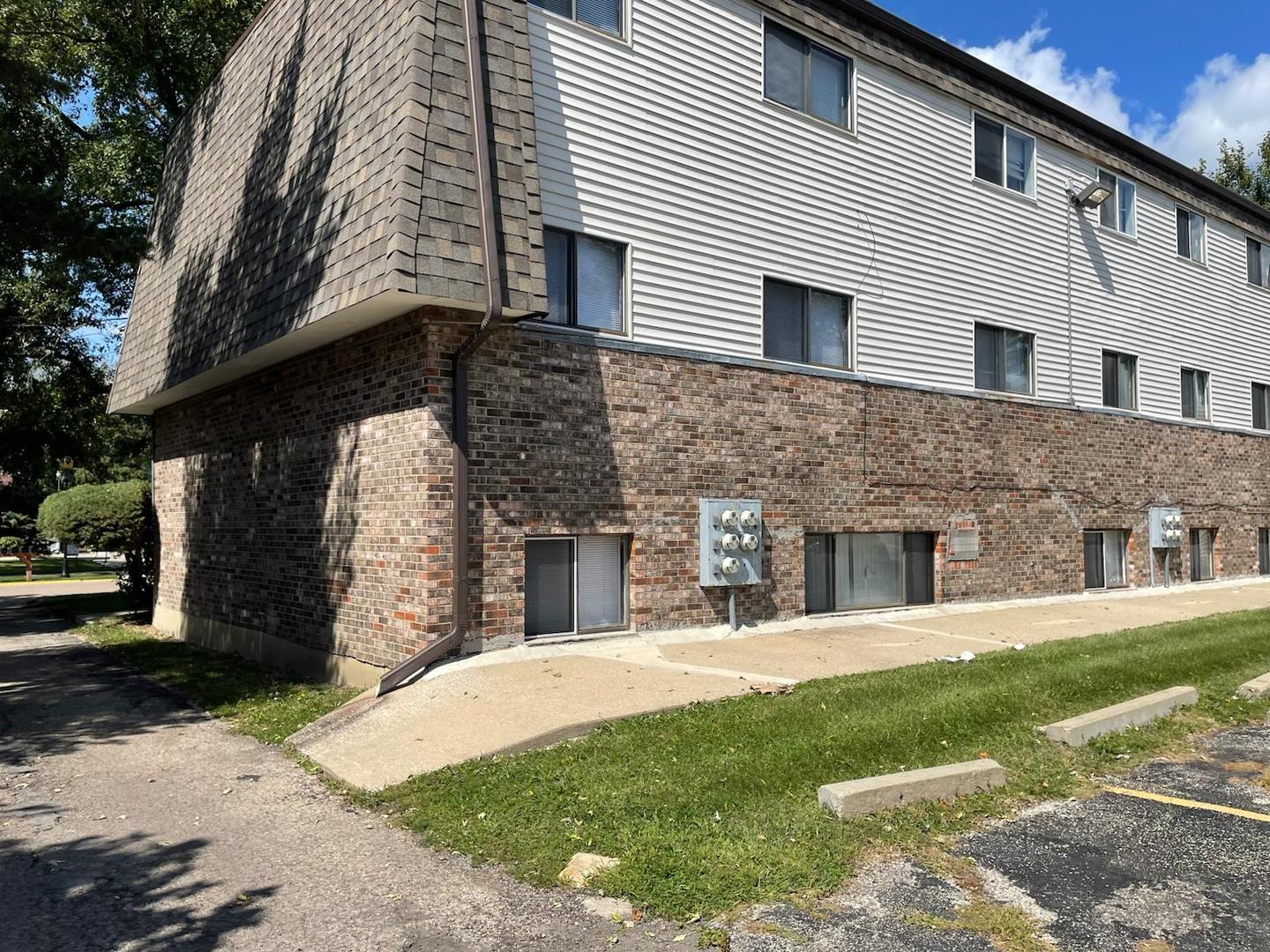1751 Felten Road, Unit 1 Aurora, IL 60505 - Photo 19 of 19 a view of a white house with a large windows
