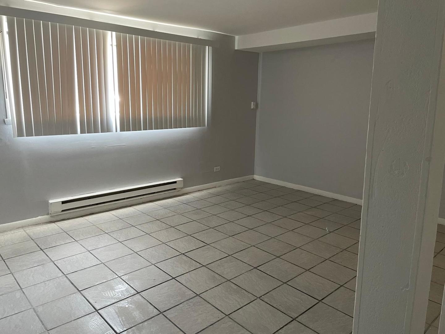 1751 Felten Road, Unit 1 Aurora, IL 60505 - Photo 5 of 19 a view of a room with wooden floor