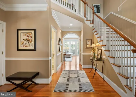 a utility room with sink dryer and washer