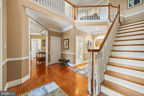 a kitchen with stainless steel appliances granite countertop a stove microwave and sink