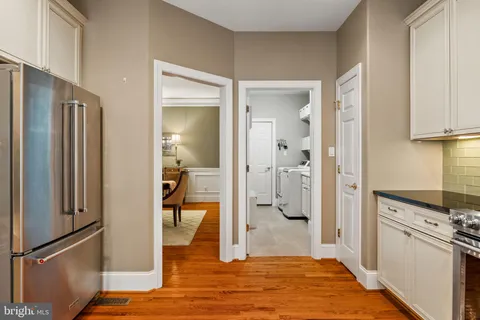 a view of a livingroom with furniture and wooden floor