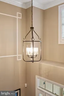 a patio with a patio table and chairs