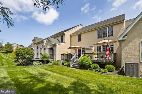 a view of a house with a garden