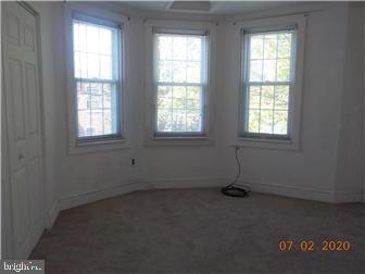 1205 Beech Street Wilmington, DE 19805 - Photo 11 of 13 an empty room with windows
