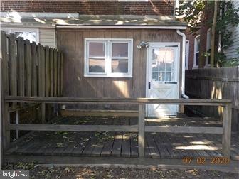 1205 Beech Street Wilmington, DE 19805 - Photo 12 of 13 a kitchen with a refrigerator and a stove