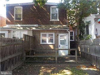 1205 Beech Street Wilmington, DE 19805 - Photo 13 of 13 a front view of a house with a yard